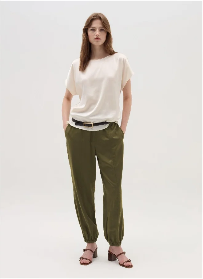 او في اس Pull-on trousers with raised stitching