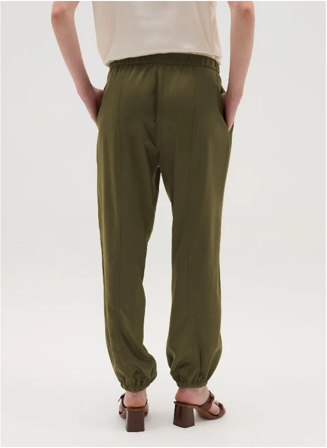 او في اس Pull-on trousers with raised stitching