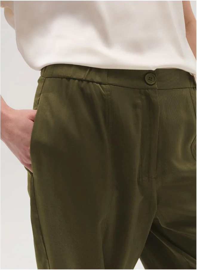 او في اس Pull-on trousers with raised stitching