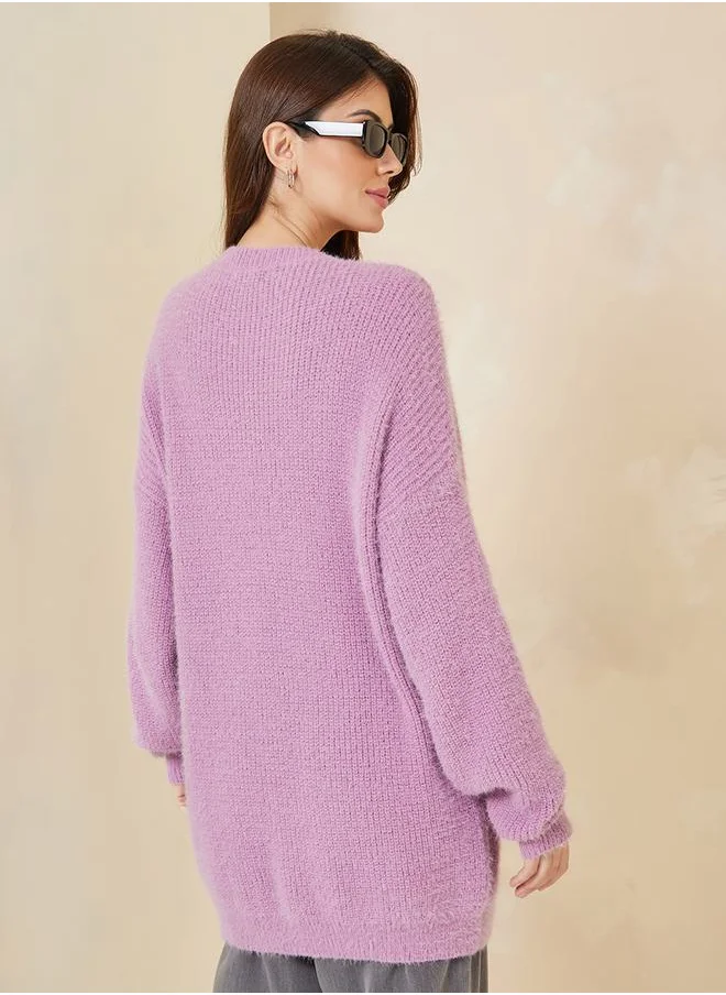 ستايلي Oversized Longline Fuzzy Yarn Sweater