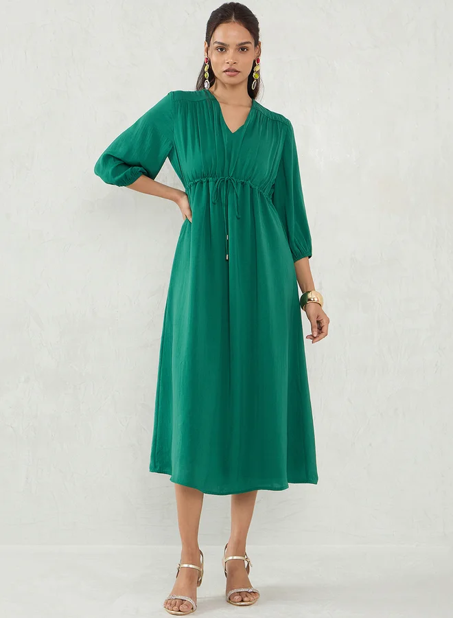 فيميلا Femmella Green Solid Drawstring Waist A-Line Midi Dress