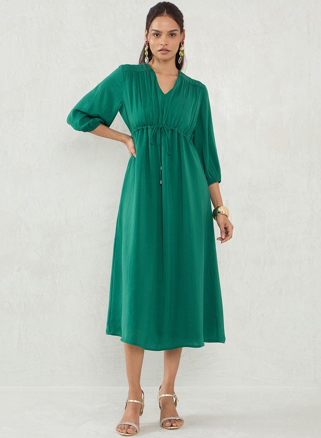 Femmella Green Solid Drawstring Waist A-Line Midi Dress - Image 1