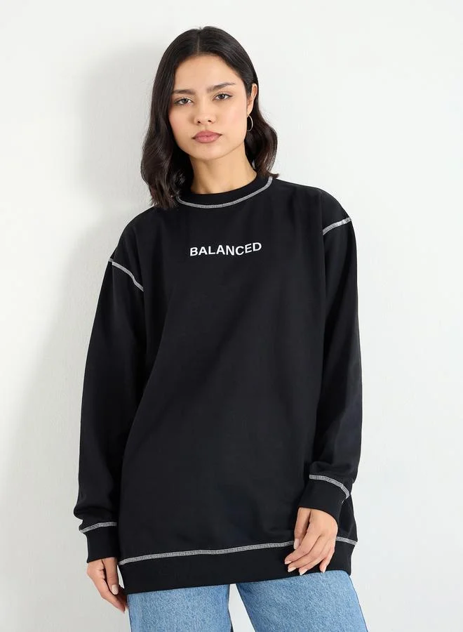Styli Styli Black Longline Embroidered Slogan Sweatshirt