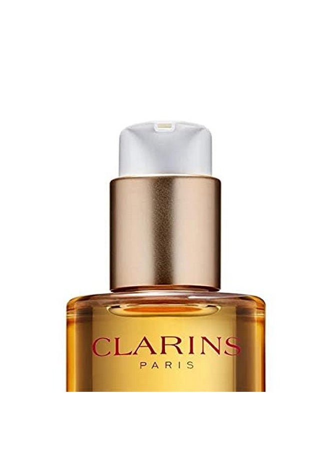 CLARINS - Total Cleansing Oil ; Removes Longwearing, Heavy And Waterproof Makeup And Pollutants ; Preserves Skin'S Microbiota ; Easy Rinse ; Safe For Use On Face, Eyes And Lips ; Dermatologist Tested - Image 1