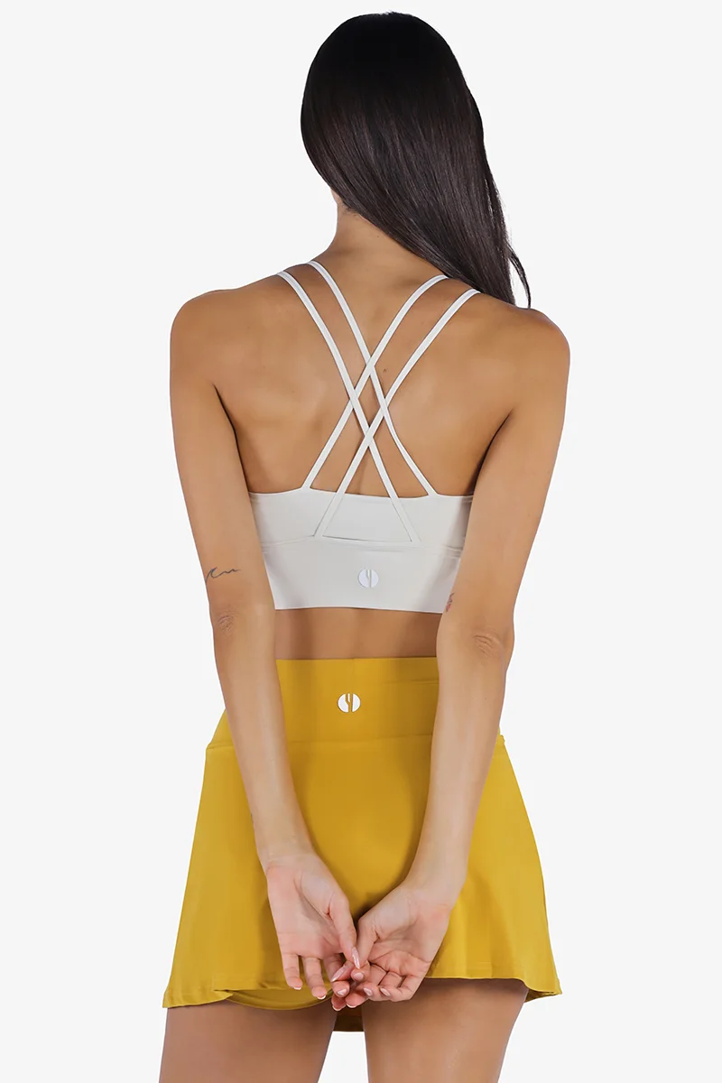 ياسيكو YesEco Women’s White Sports Bra – High-Support Strappy Criss-Cross Padded Activewear for Yoga, Fitness & Gym | 75% Recycled Nylon, 25% Spandex | Sustainable Bra Only