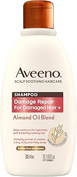 Aveeno شامبو أفيينو لإصلاح الأضرار بزيت اللوز لتهدئة فروة الرأس للشعر التالف 300 مل - Image 1