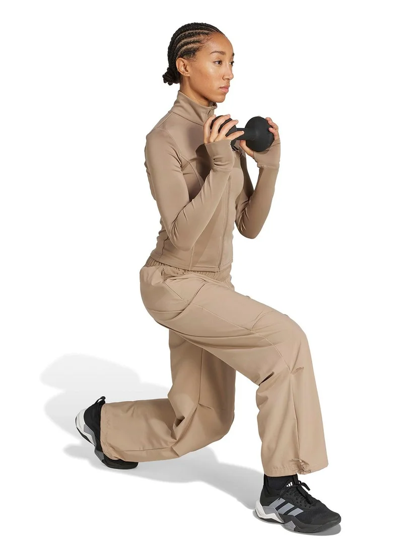 Adidas beige Workout Essentials Woven Training Pants for Women | Best Price UAE