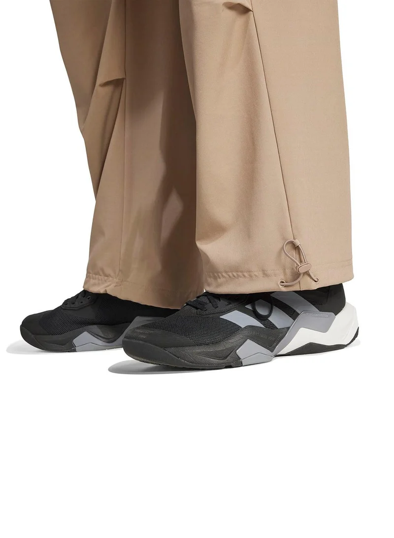 Adidas beige Workout Essentials Woven Training Pants for Women | Best Price UAE