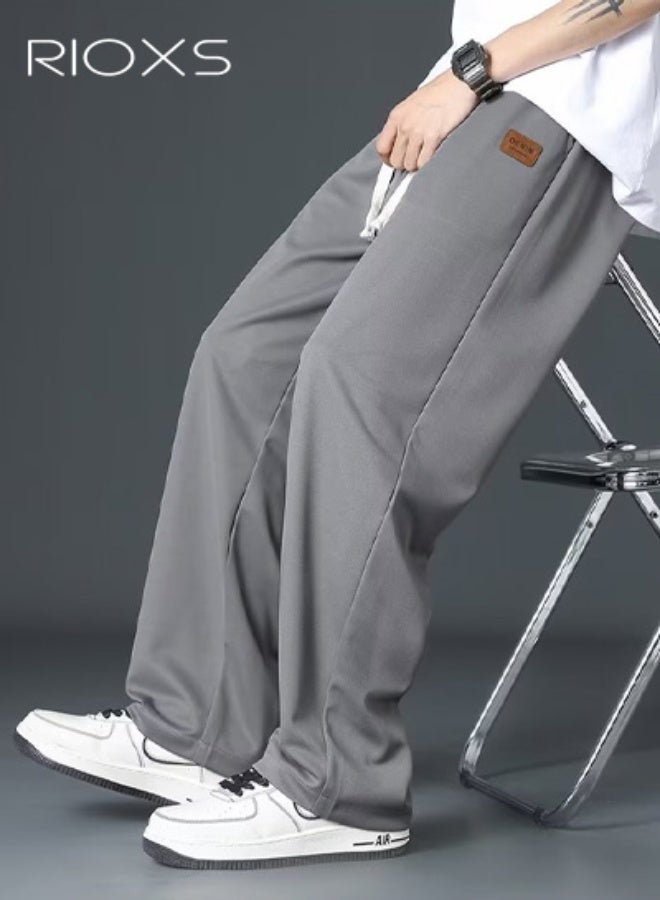 ريوكس بنطال رياضي رجالي، بنطال رياضي فضفاض من الحرير الجليدي مع جيوب جانبية، بنطال جري مريح بخصر مطاطي ورباط، بنطال كاجوال مستقيم واسع الساقين ومقاوم للتجعد، بنطال رياضي جاهز للصالة الرياضية، بنطال رياضي سريع الجفاف للأنشطة الترفيهية والخارجية، رمادي - Image 4