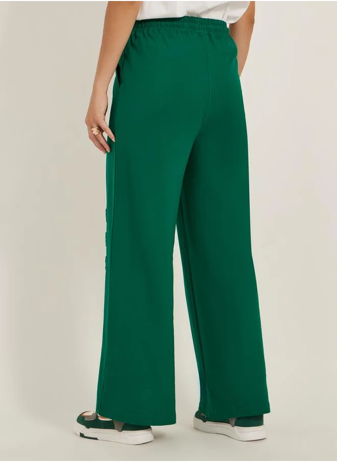 ستايلي Embossed Hem Wide Leg Joggers with Drawstring Waist