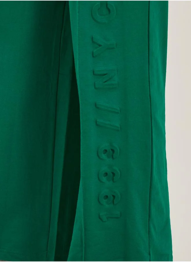 ستايلي Embossed Hem Wide Leg Joggers with Drawstring Waist