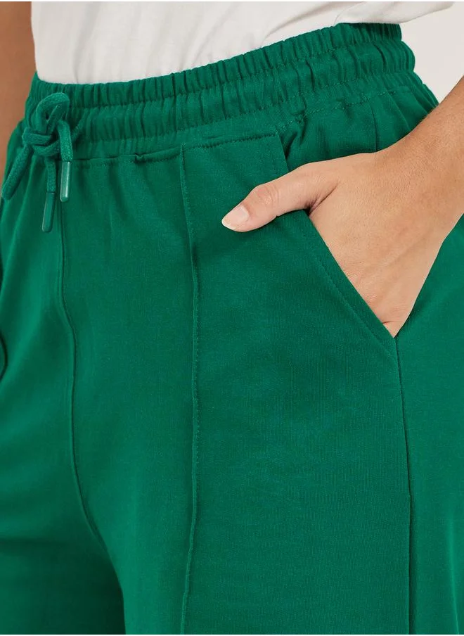 ستايلي Embossed Hem Wide Leg Joggers with Drawstring Waist