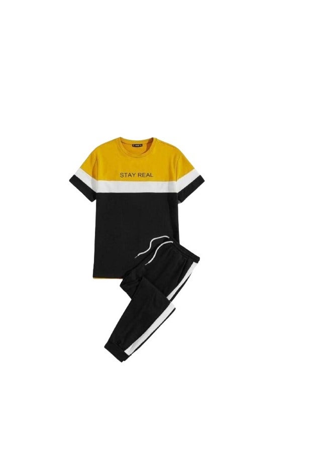 A confusing outfit for boys, black and white pants and a black and yellow T-shirt - Image 2