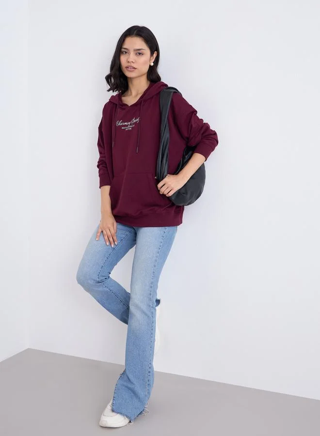 Styli Burgundy Oversized Slogan Print Hoodie