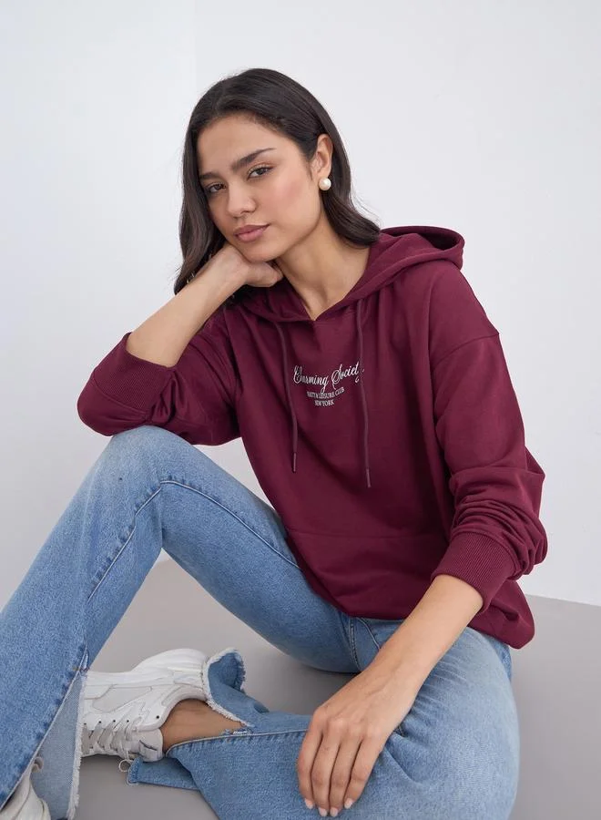 Styli Styli Burgundy Oversized Slogan Print Hoodie
