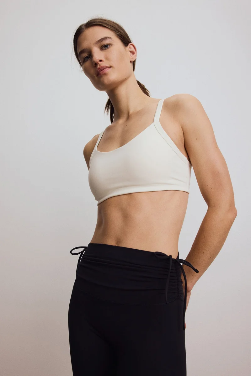 H&M Flared sports leggings with SoftMove™