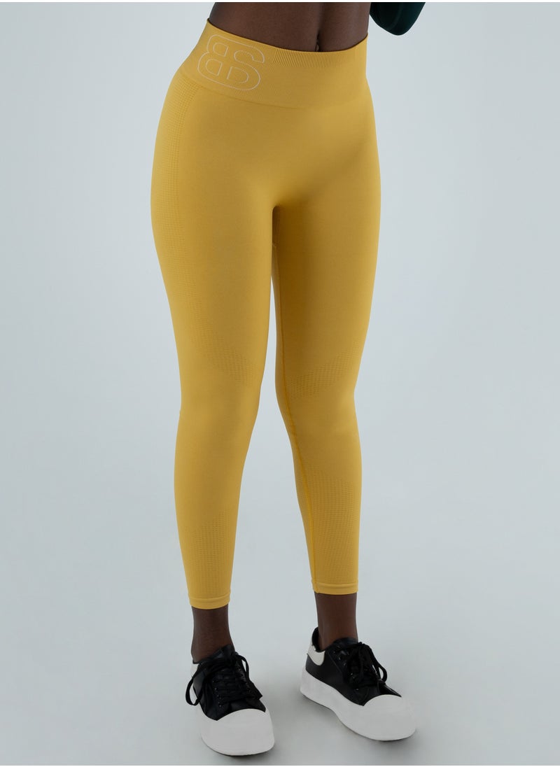 Bernessi Turkey Nylon Sports Leggings for Women High Waisted Ladies Workout Running Fitness Yoga Gym Pants with Tummy Control Textured Yellow Pollen  - Image 1