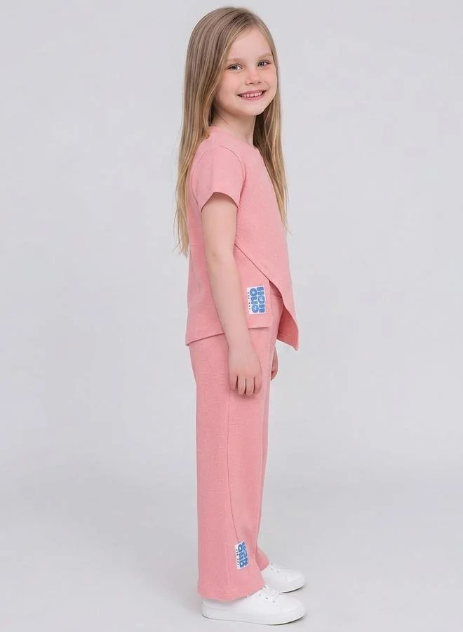 Take Two Girls Light Pink Textured Patchwork Asymmetric Hem T-Shirt and Trousers Set By Juniorloom