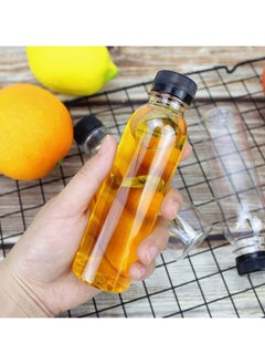 Generic Pack of 12 clear juice bottles, 197*28 round empty reusable plastic bottles with black cap.  - Image 2