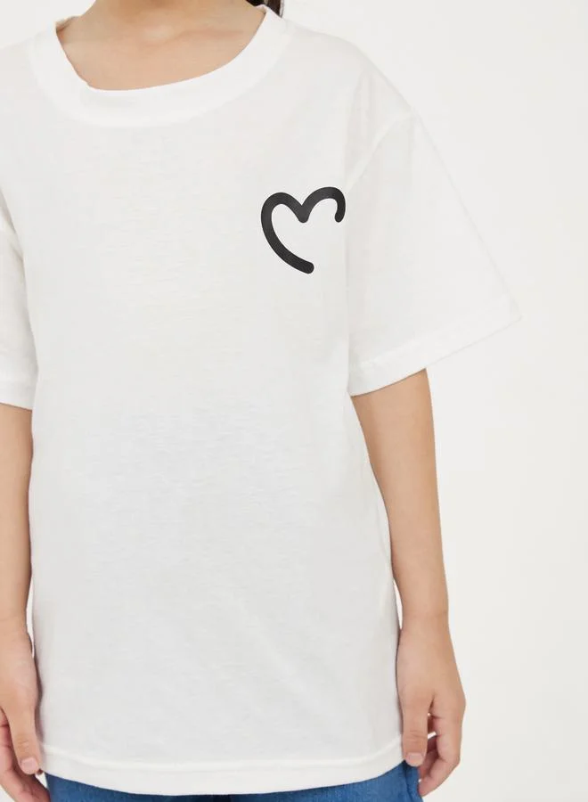 ستايلي Loose Fit Heart Print Drop Shoulder T-Shirt