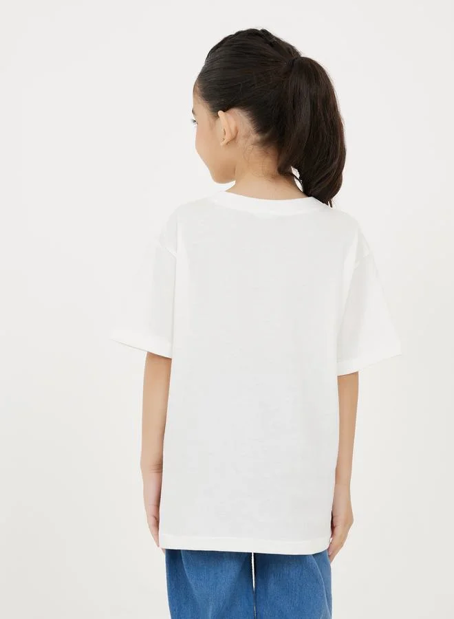 ستايلي Loose Fit Heart Print Drop Shoulder T-Shirt
