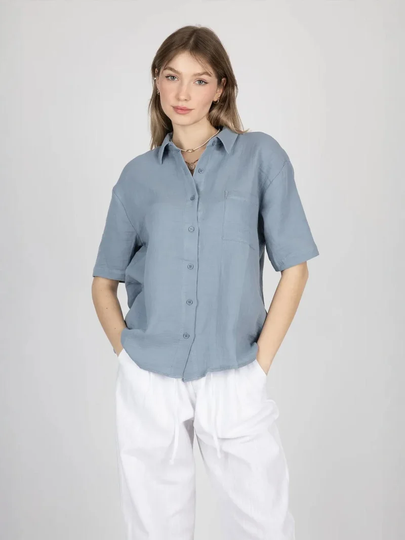 زوبعة قميص بأكمام قصيرة وجيب