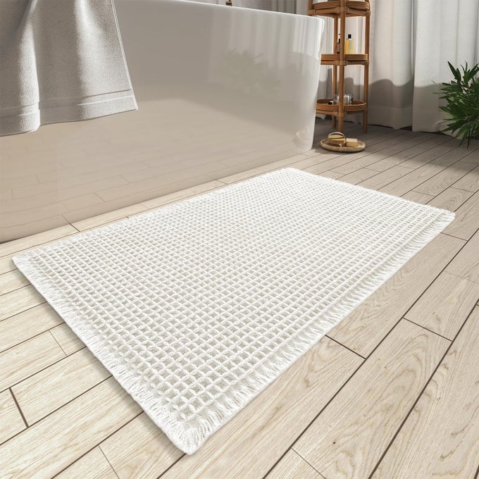 UPGRADED WAFFLE BATH MAT SUPER ABSORBENT NON SLIP BATH MATS FOR BATHROOM FLOOR MACHINE WASHABLE BATHROOM RUGS WITH TASSELS RUBBER BACKED BATHROOM MATS ULTRA SOFT 17 X 24 WHITE