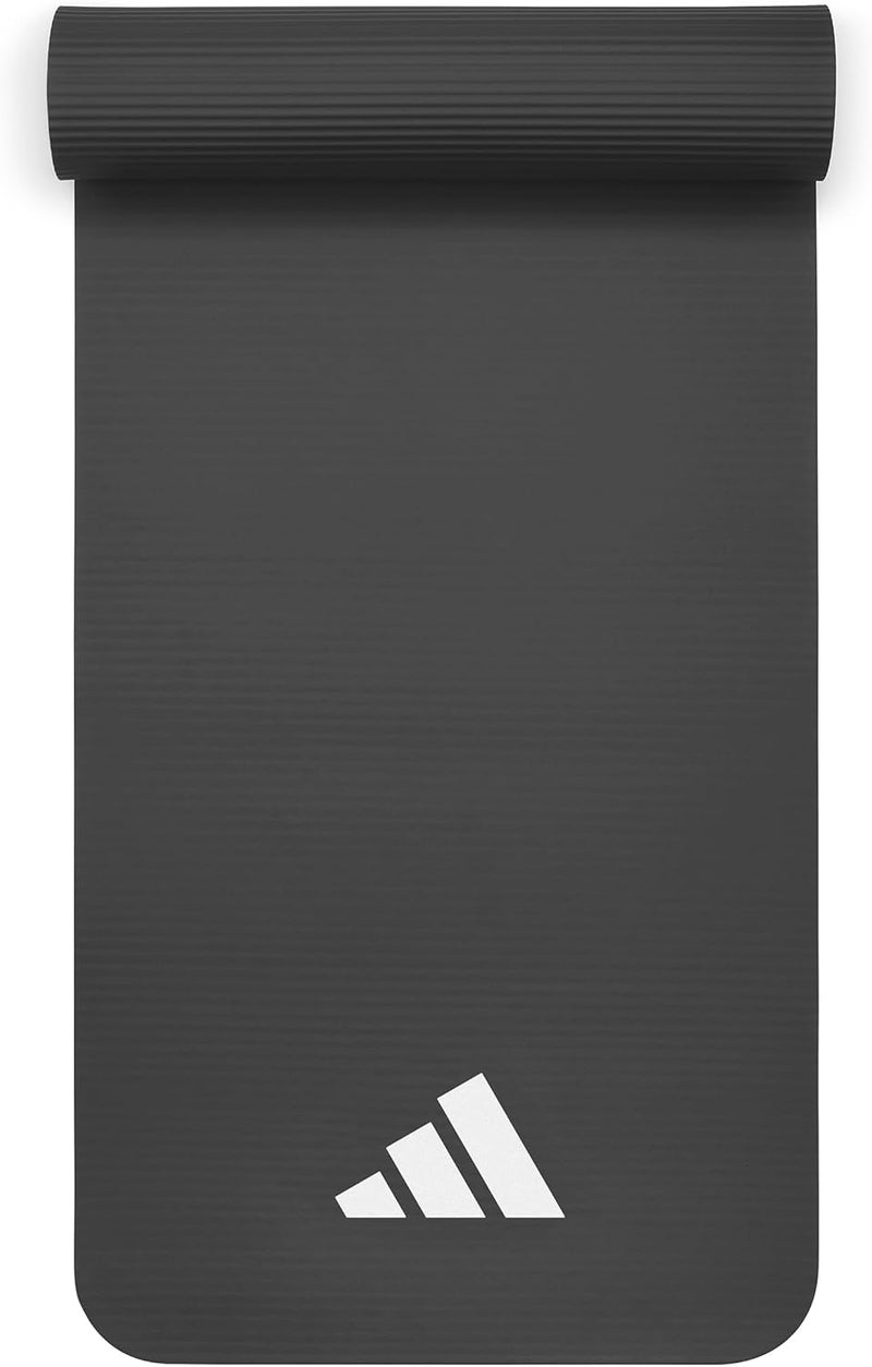 اديداس سجادة لياقة بدنية أديداس بسماكة 10 مم مع حزام حمل – مبطنة ومضادة للانزلاق لليوغا وتمارين الأرضية في المنزل والجيم – أسود - Image 1