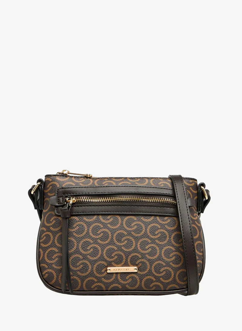 سيليست حقيبة كروس بودي بطبعة المونوغرام بحزام قابل للتعديل وإغلاق بسحاب