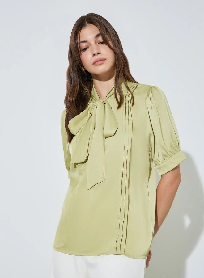 Styli Green Solid Tie-Up Neck Blouse With Pintuck Detail