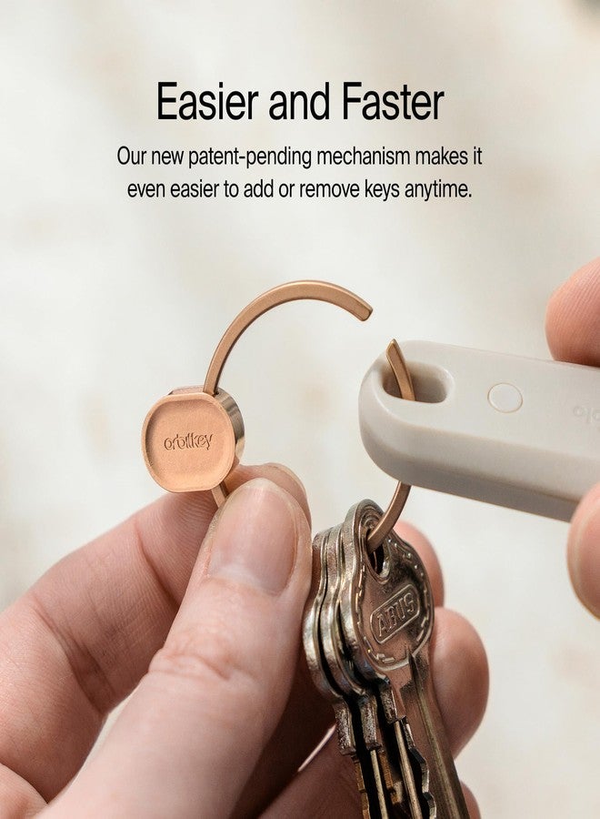 أوربيتكي حلقة مفاتيح Orbitkey Ring V2 سريعة الفك - حامل مفاتيح سهل الاستخدام مع آلية قفل آمنة - منظم سلسلة مفاتيح بسيط للاستخدام اليومي - متين، رفيع، ومناسب للجيب (ذهبي وردي) - Image 4