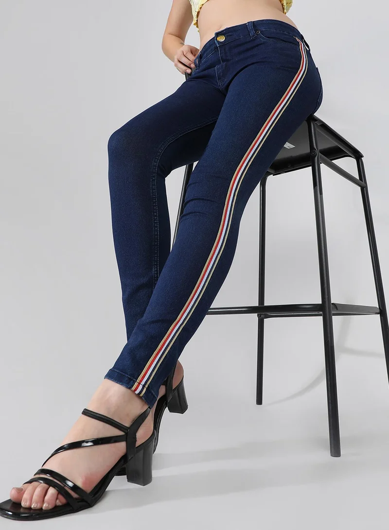 كامبوس سوترا Campus Sutra Women's Classic Dark Blue Dark-Washed Side-Striped Skinny Fit Denim Jeans | Stretchable Cotton Mid-Rise Crafted With Comfort Fit and High Performance For Everyday Wear