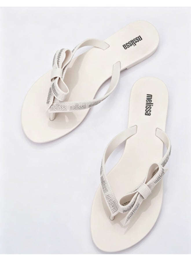 Melissa Flat Minimalist Bow Letter‑Print Flip‑Flops for Women - Image 1