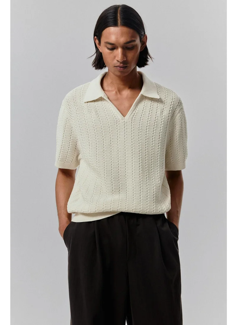 H&M Regular Fit Textured-knit polo shirt