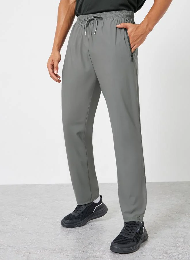 ستايلي اكتيف بنطلون رياضي رجالي رمادي بقصة مريحة وجيوب بسحاب