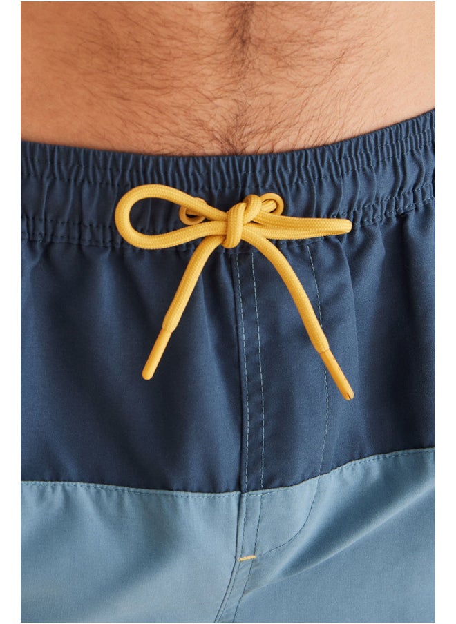 women'secret - Men's color block swimsuit - Image 1