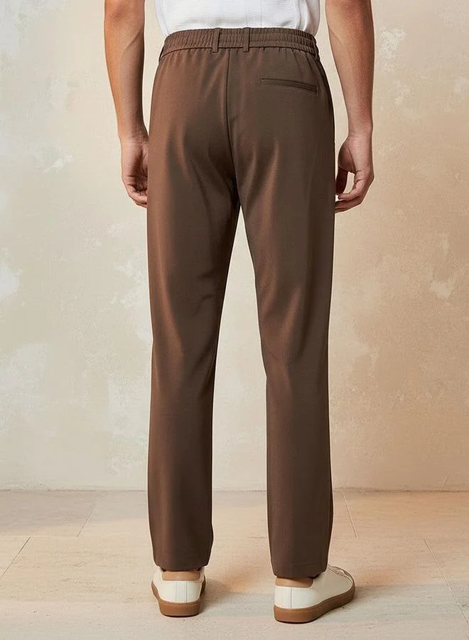 Iconic BROWN Iconic Regular Fit Trousers for Men | Best Price UAE