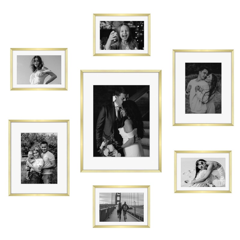 Frametory, Gold Aluminum Picture Frame with Removable Mat - Set of 7 Includes Four 5x7, Two 8x10, One 11x14 - Real Glass Front - Simple Gallery Wall Frames for Art Prints and Posters - Image 1