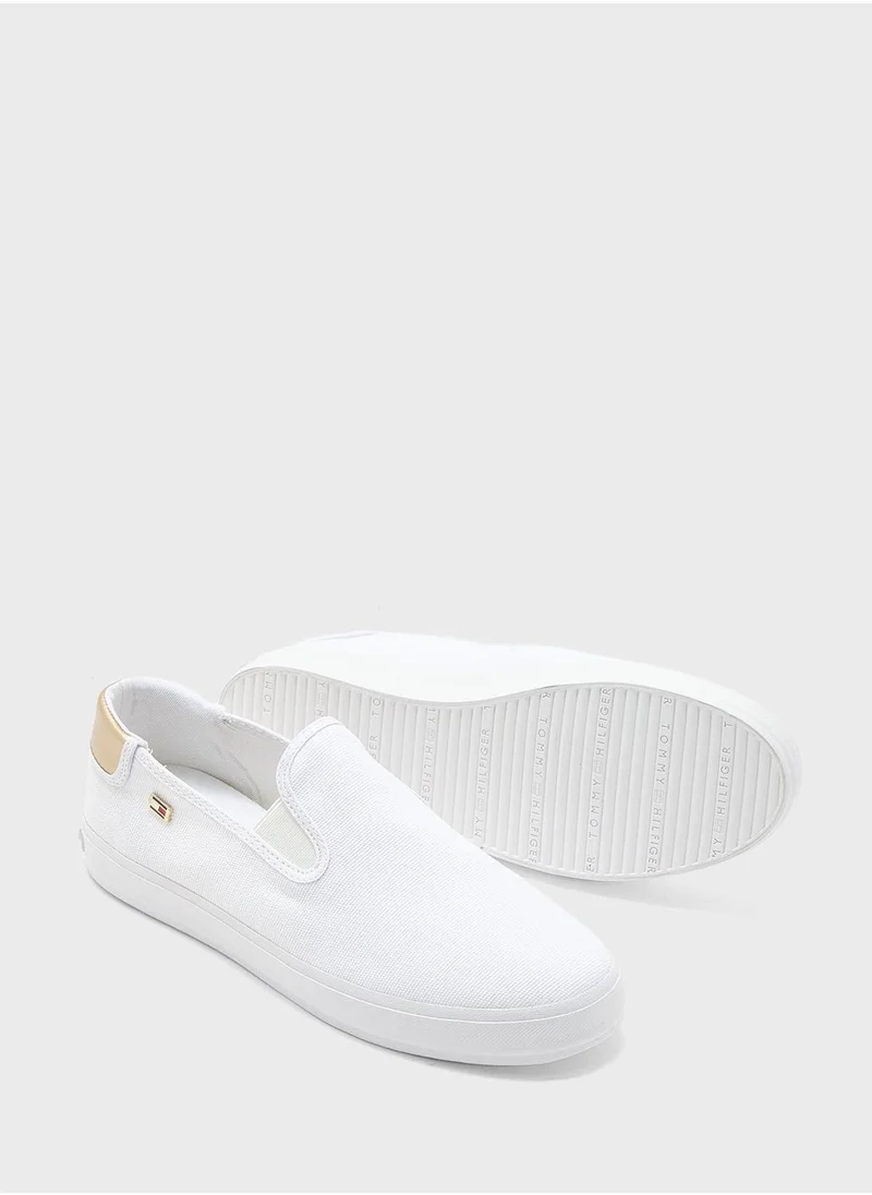 TOMMY HILFIGER VULCANISED CANVAS SLIP ON TRAINERS