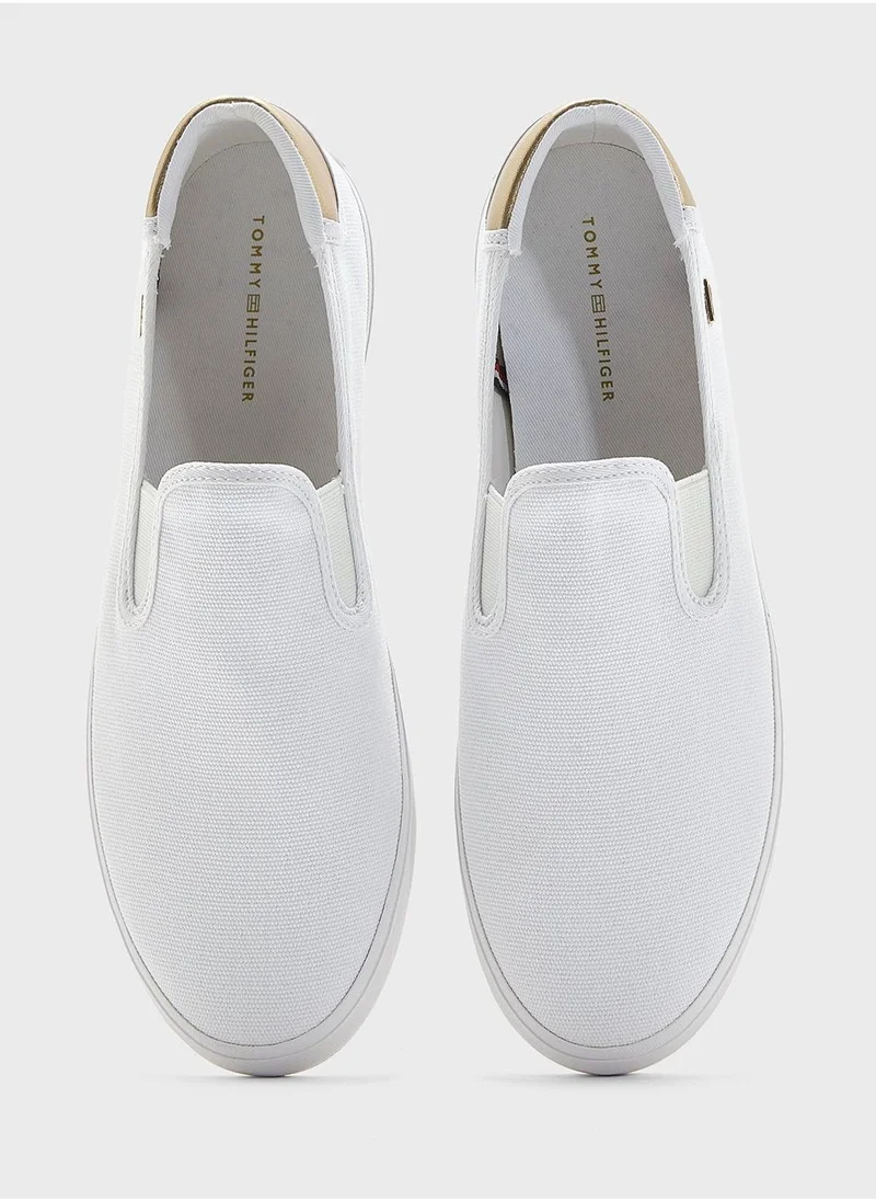 TOMMY HILFIGER VULCANISED CANVAS SLIP ON TRAINERS