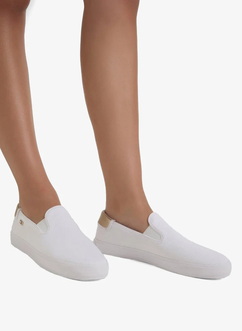 TOMMY HILFIGER VULCANISED CANVAS SLIP ON TRAINERS