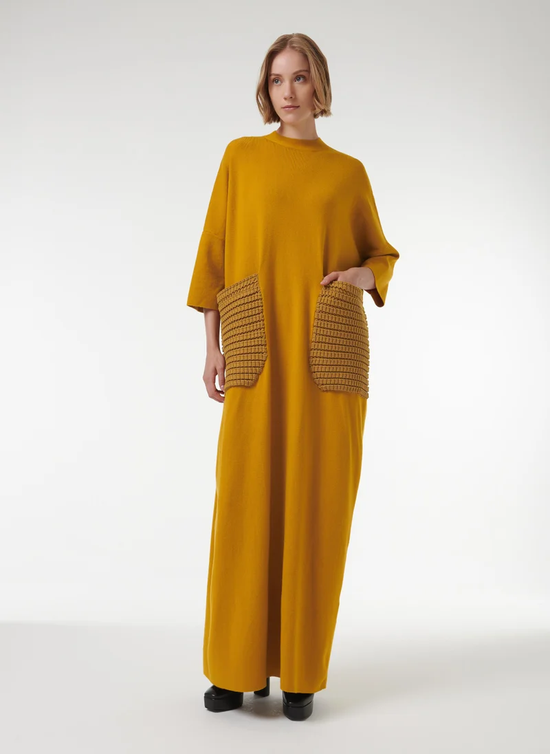 ليم قفطان مع جيوب مزينة بنقشات