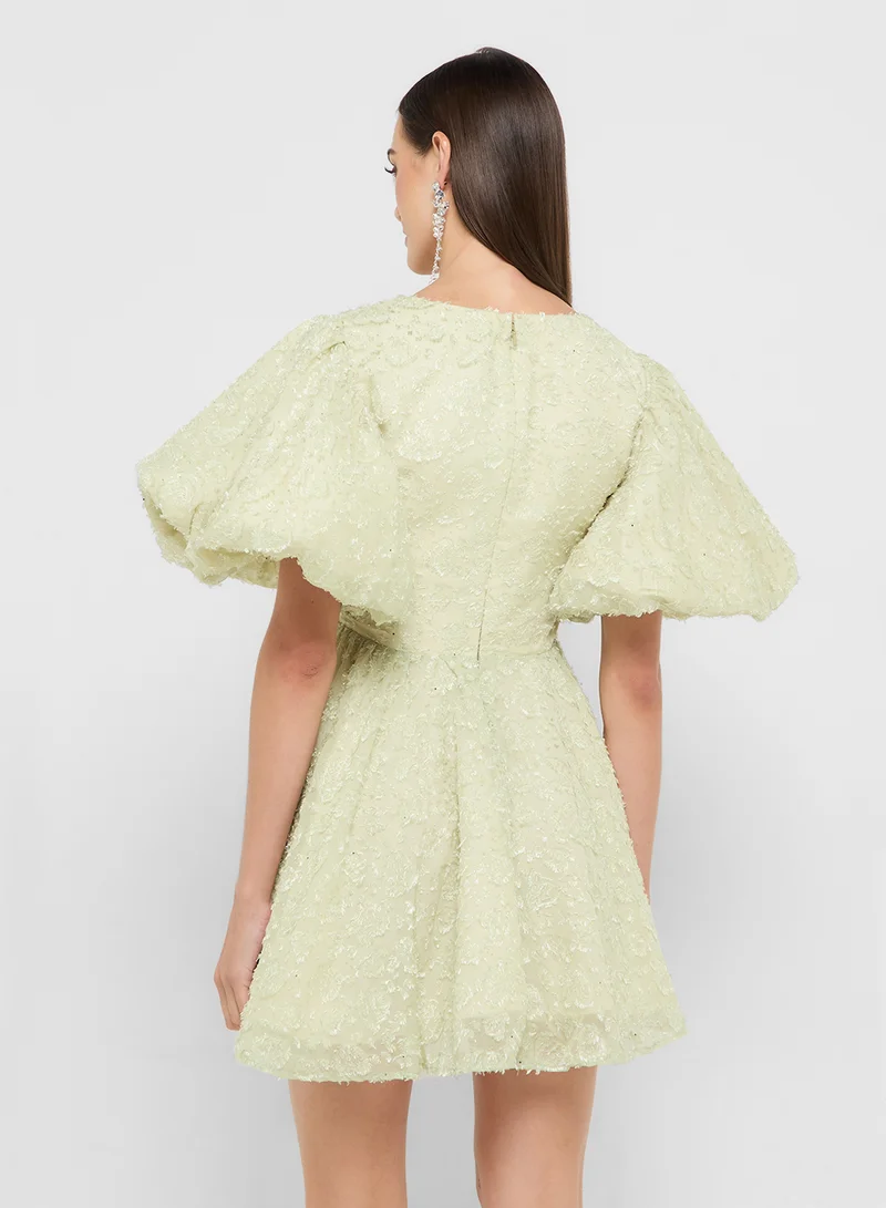 جينجر بوتيك eclat luxe puff sleeves baby ruffle skater dress