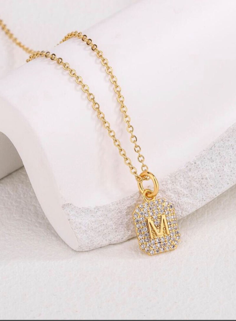 إيكوال سلسال نسائي مصنوع من الاستانلس ستيل مطلي باللون الذهبي بتعليقة صغيرة جدًا مرصعة بالزركون - Image 1