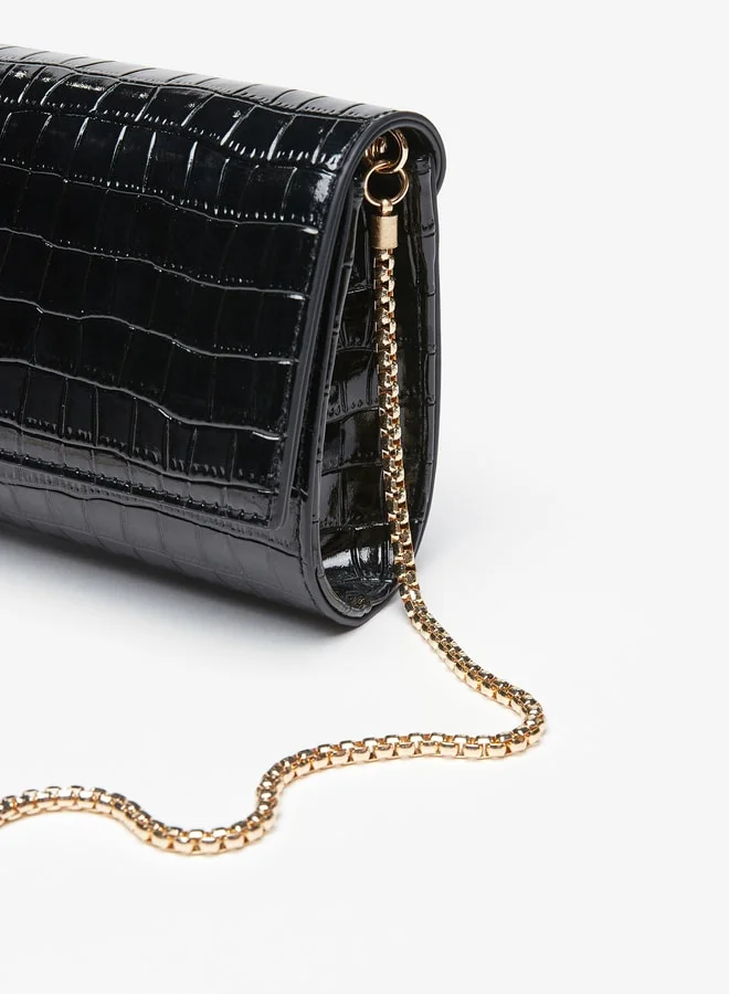 سيليست Women's Textured Clutch with Metallic Chain Strap and Snap Button Closure