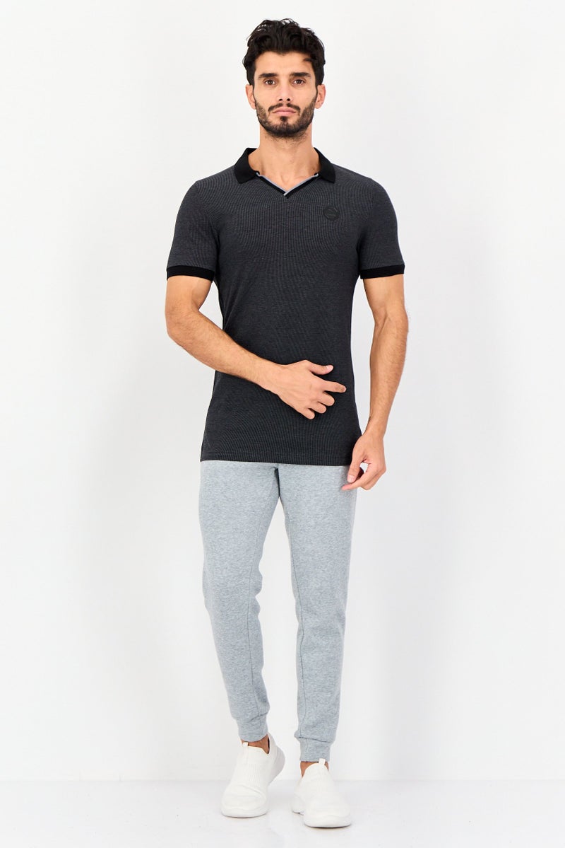 PUMA Men Sportswear Fit Short Sleeve Outdoor T Shirt, Black - Image 2