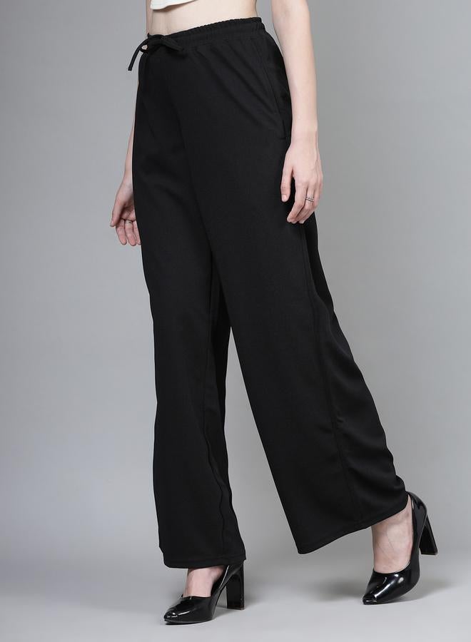 بوز بنطلون نسائي واسع الساق بخصر برباط أسود سادة - Image 2