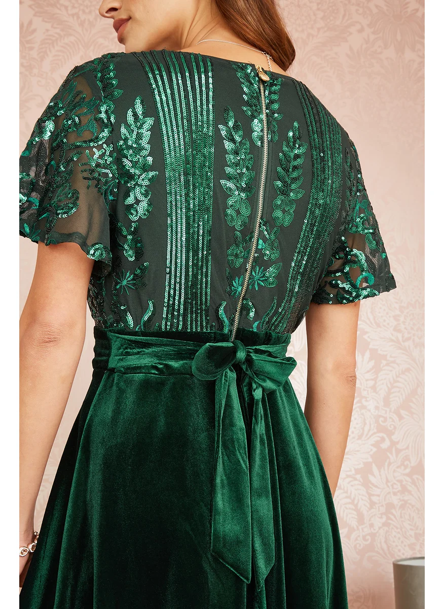 يامي Embellished Velvet Wrap Skater Midi Dress