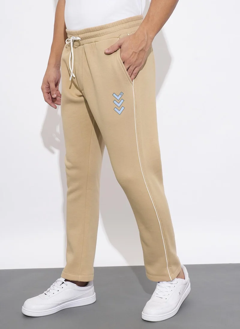 Being Human BEIGE Solid Men Mid-Rise Track Pants for Men | Best Price UAE
