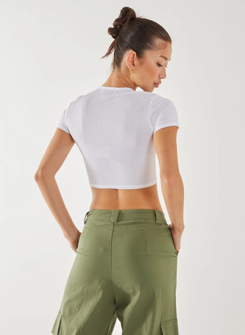 بينك فانيلا تيشيرت مطبوع بالموتور